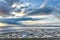 Clouds, mountains and mudflats