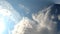 Clouds move like a veil in the Bavarian blue and white sky in 4K