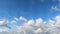 Clouds move like a veil in the Bavarian blue and white sky in 4K