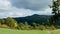 Clouds movement over the mountains timelapse fast view.