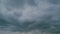 Clouds moving in sky. Dark ominous grey storm clouds. Time lapse.