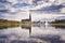 Clouds and old town of Schwerin are reflected in the lake Pfaffenteich