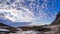 Clouds over a fjord on Gimsoy in a timelapse