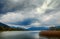 Clouds over the lake Tegernsee and the Bavarian Alps, beautiful landscape with mountains, water and sky in the famous tourist