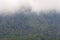 Clouds over mountain in Guatemala, sign of deforestation in central america.