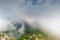 Clouds over the mountains. Fog