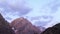 Clouds over mountains. Zoom. Time Lapse. Pamir, T