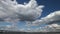 Clouds over the river. Beautiful clouds over the bridge across the river