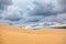 Clouds over sandy duna