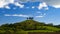 Clouds over tree topped Colmer\'s Hill, Dorset