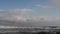 Clouds and rainbow in the sky over the ocean. South Africa. Mossel bay