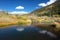 Clouds reflecting in beaver pond in the Sangre De Cristo Range of the Rocky Mountains on the Medano Pass primitive road in