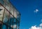 Clouds reflecting in glass building