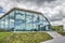 Clouds reflecting in museum facade