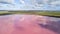 Clouds reflecting in the pink lake 02