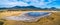 Clouds reflecting in a small lake and Grampians mountains.