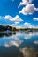 Clouds reflecting in the water at the harbor in Chesapeake City, Maryland.