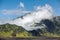 Clouds on the ridge of Mount Bromo volcano caldera,