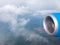 Clouds,roads and fields, engine and wing of plane. Aerial view from plane illuminator