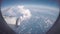 Clouds seen through the window of jet airplane. Airplane flies above the weather