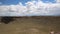 Clouds shadow coming into meteor crater