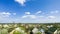 Clouds in the Sky Moving over the Houses in the City. Time Lapse