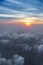 clouds sky skyscape in sunset time. view from the window of an airplane flying in the clouds, top view clouds like  the sea of