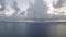 Clouds in sunlights over the Ocean next to Bali Island 4K Drone shot