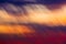 Clouds on sunset shooted with camera motion. Abstract background