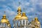 Clouds surround St Michaels in Kiev classic golden cupolas of th