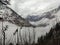 Clouds surrounding mountains