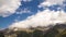 Clouds time lapse over alpine landscape