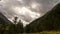 Clouds time lapse over alpine landscape