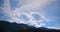 Clouds Time Lapse over Dramatic Mountains Silhouette