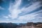 Clouds in the wind; top Zugspitze in the Wetterstein mountain, Experienced people hiking advenure under beautiful sky of Alpen