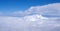 cloudscape from above. blue sky cumulus clouds. earth from above