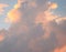 Cloudscape - Abstract Natural Background - Yellowish Orange and Dark Cumulonimbus Clouds in Blue Sky