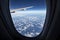 Cloudscape against blue sky through air plane window