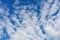 Cloudscape with altocumulus clouds, Altocumulus middle-altitude cloud in stratocumuliform - natural background