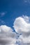 Cloudscape background. Blue sky background with white clouds. Sky after raining. Close up view of beautiful blue sky background.