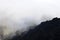 Cloudscape. Mountain range and peaks covered in clouds, fog and mist on Madeira Island , Portugal