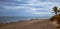 Cloudscape Over Eroding Sand Dune