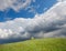 Cloudscape over hillside