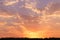 Cloudscape panorama over sunser sky.