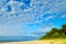 Cloudscape with stratocumulus cloud formation over the beach at Baltic sea.