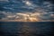 Cloudscape with sunrays over sea in London, United Kingdom. Sea on cloudy sky. Clouds on dramatic sky. Evening nature