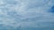 Cloudscape With Various Cloud Types On Background Of Blue Sky. Semi-Transparent Layers On Different Height. Timelapse.