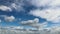 Cloudscape white fluffy cumulus cloud in the blue sky sunny day amazing timelapse