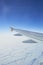 Cloudscape from window airplane, landscape of wing plane on a cloudy sky