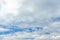 Cloudy blue real sky with light grey clouds. The blur sky background, high resolution 4